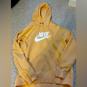 yellow orangeish nike men’s hoodie it was wore 2 times the size is L